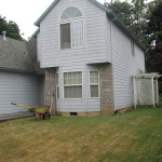 grass-filled yard - site of new rain garden