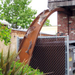 downspout art with swimming salmon