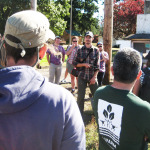 Rowan explains the irrigation system at Headwaters Farm